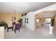 Open dining area showcasing seamless flow into the living room and kitchen at 4219 Eastlake Ct, Port Charlotte, FL 33948