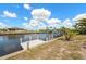 Waterfront home featuring a private boat dock along a navigable canal at 4219 Eastlake Ct, Port Charlotte, FL 33948