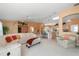 Spacious living area featuring an open floorplan, blending seamlessly with the kitchen and dining spaces at 4219 Eastlake Ct, Port Charlotte, FL 33948