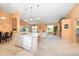 Bright and airy living space featuring an open kitchen, living room, and dining area for seamless entertaining at 4219 Eastlake Ct, Port Charlotte, FL 33948