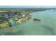 A stunning aerial of the waterfront community, canals, and waterways at 452 Picasso Dr, Nokomis, FL 34275