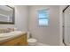 Bright bathroom featuring a large window and shower at 452 Picasso Dr, Nokomis, FL 34275
