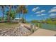 Private dock access on the canal, perfect for boating and enjoying the tranquil waterfront lifestyle at 452 Picasso Dr, Nokomis, FL 34275