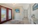 Welcoming foyer featuring double doors, tiled floor and decorative accents at 452 Picasso Dr, Nokomis, FL 34275