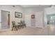 Hallway sitting area with tile flooring and access to other rooms at 452 Picasso Dr, Nokomis, FL 34275