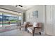 Cozy sitting area with view of pool and lanai at 452 Picasso Dr, Nokomis, FL 34275