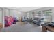 Spacious living room featuring neutral walls and lots of natural light at 4806 Huntleigh Dr, Sarasota, FL 34233