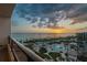 Stunning sunset view from balcony overlooking the beach, pool and manicured grounds at 535 Sanctuary Dr # A602, Longboat Key, FL 34228