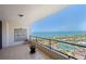 Balcony with a view of the ocean, pool and landscaped grounds at 535 Sanctuary Dr # A602, Longboat Key, FL 34228