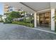 Inviting entrance with lush landscaping and elegant architecture, welcoming residents and guests at 535 Sanctuary Dr # A602, Longboat Key, FL 34228