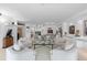 Bright living room featuring modern decor, light hardwood floors, and elegant furnishings, perfect for entertaining at 535 Sanctuary Dr # A602, Longboat Key, FL 34228