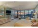 Inviting main bedroom featuring a calming sunset view and stylish furnishings at 535 Sanctuary Dr # A602, Longboat Key, FL 34228