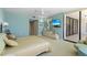 Relaxing main bedroom with a large bed, stylish furniture, and serene ambiance at 535 Sanctuary Dr # A602, Longboat Key, FL 34228