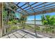 Lovely waterfront views from this condo's private balcony with wood pergola at 5395 Lake Arrowhead Trl # 24, Sarasota, FL 34231