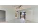 Light-filled bedroom boasts access to a balcony and a ceiling fan for added comfort at 5395 Lake Arrowhead Trl # 24, Sarasota, FL 34231