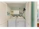 Convenient laundry closet with washer and dryer for easy chore completion at 5395 Lake Arrowhead Trl # 24, Sarasota, FL 34231