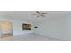 Bright living room with pass-through kitchen access and lots of natural light at 5395 Lake Arrowhead Trl # 24, Sarasota, FL 34231