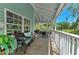 Inviting porch with ample seating and pleasant views, perfect for relaxation and enjoying the outdoors at 5395 Lake Arrowhead Trl # 24, Sarasota, FL 34231