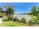 Expansive water view of the lake from the lawn with walking path at 5395 Lake Arrowhead Trl # 24, Sarasota, FL 34231