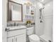 Cozy bathroom with marble countertop, shower, and decorative accents, offering a clean, comfortable space at 548 Beach Rd # 540A, Sarasota, FL 34242