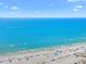 Breathtaking aerial view of the ocean and beach with a beautiful blue sky at 548 Beach Rd # 540A, Sarasota, FL 34242
