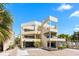 Stunning multi-level home with unique architectural design, balconies, and well-maintained landscaping at 548 Beach Rd # 540A, Sarasota, FL 34242