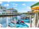 Modern waterfront homes with private docks, providing convenient access for jet skis and water activities at 548 Beach Rd # 540A, Sarasota, FL 34242