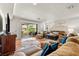 A spacious living room features hardwood floors and comfortable seating arrangements at 548 Beach Rd # 540A, Sarasota, FL 34242