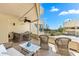 A comfortable patio has beautiful wicker furniture and an ocean view at 548 Beach Rd # 540A, Sarasota, FL 34242