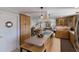 Spacious kitchen boasts wooden cabinets, modern appliances, and an eat-in island at 606 Emerald Ln, Holmes Beach, FL 34217