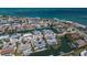 Aerial view of waterfront homes with private docks and boat access in this picturesque neighborhood at 606 Emerald Ln, Holmes Beach, FL 34217