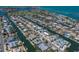 Aerial view showcasing the stunning waterfront homes and canals of this vibrant coastal community at 606 Emerald Ln, Holmes Beach, FL 34217