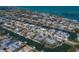Aerial view of waterfront homes with private docks and boat access in this picturesque neighborhood at 606 Emerald Ln, Holmes Beach, FL 34217