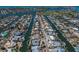 Expansive aerial view of waterfront homes and canals, perfect for boating enthusiasts and waterfront living at 606 Emerald Ln, Holmes Beach, FL 34217