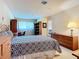 Bedroom with an organized study area and carpet floors at 6102 Penny Ln, Bradenton, FL 34207