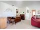 Living room featuring carpet floors and traditional-style furniture at 6102 Penny Ln, Bradenton, FL 34207