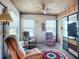 Inviting sunroom featuring cozy seating and natural light at 6102 Penny Ln, Bradenton, FL 34207