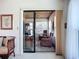 Relaxing sunroom with a sliding door to an attached room at 6102 Penny Ln, Bradenton, FL 34207