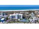 Lovely aerial view of condo building with beach access and nearby tennis courts, creating a prime location at 625 Beach Rd # 207, Sarasota, FL 34242