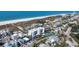 Aerial view of the condo with beach access, a tennis court, and convenient parking at 625 Beach Rd # 207, Sarasota, FL 34242