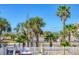 Tropical beach landscape with palm trees at 625 Beach Rd # 207, Sarasota, FL 34242