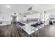 Bright kitchen bar features stylish stools, modern appliances, and ample counter space for entertaining at 625 Beach Rd # 207, Sarasota, FL 34242