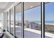 Incredible ocean view framed by floor-to-ceiling windows bringing lots of natural light into the unit at 625 Beach Rd # 207, Sarasota, FL 34242