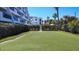 Enjoy the meticulously maintained outdoor putting green on this desirable condo community grounds at 625 Beach Rd # 207, Sarasota, FL 34242