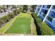 Enjoy the outdoor putting green surrounded by tropical landscaping at this desirable condo community at 625 Beach Rd # 207, Sarasota, FL 34242