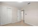 Bedroom featuring tile floors and a closet at 6732 Washington Pl, Bradenton, FL 34207