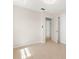 Bedroom with neutral walls, closet, and tile floors for a clean look at 6732 Washington Pl, Bradenton, FL 34207
