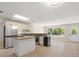 Bright kitchen with island, stainless steel appliances, and skylight at 6732 Washington Pl, Bradenton, FL 34207