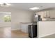 Bright kitchen features updated cabinets and stainless steel refrigerator at 6732 Washington Pl, Bradenton, FL 34207