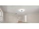 Spacious living room features an open floor plan and modern lighting fixture at 6732 Washington Pl, Bradenton, FL 34207